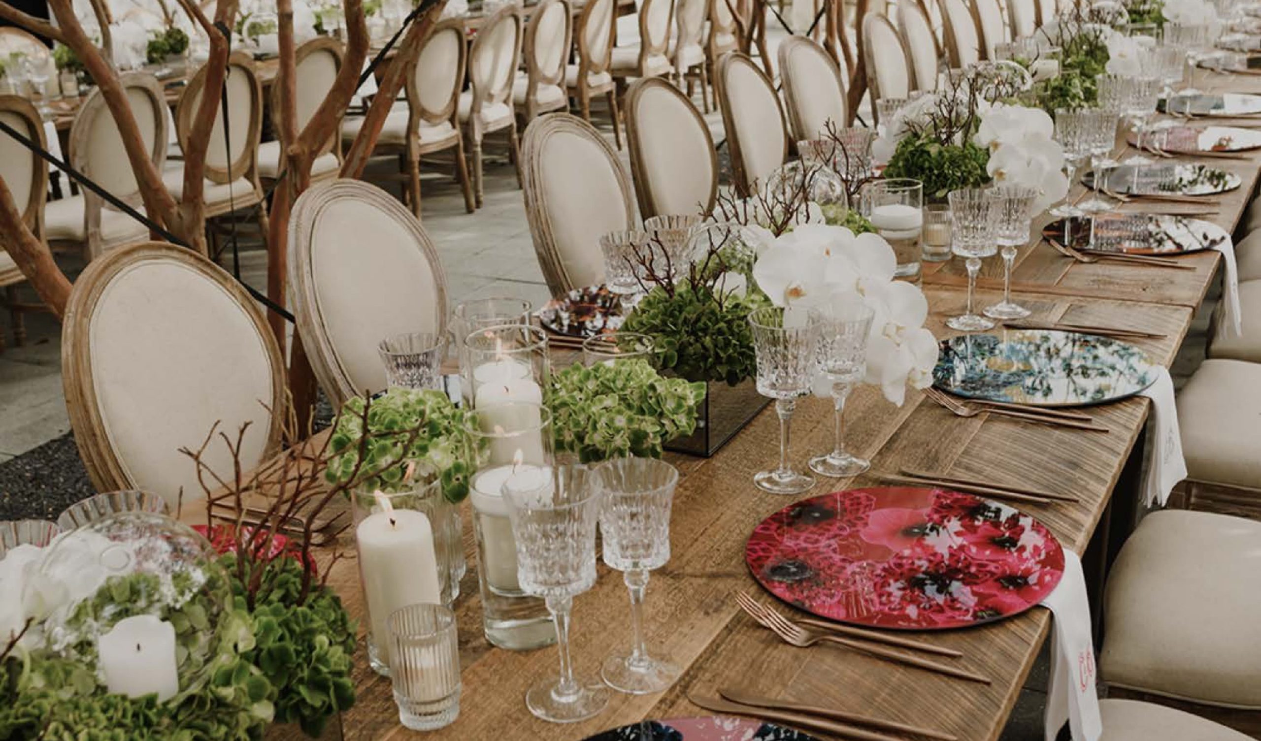 Tropical wedding theme image featuring glass placemats